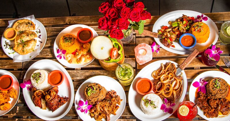Several dishes served on table, top view