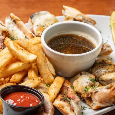 Broiled Brazilian Lobster Tail  served with fries and dipping sauces.
