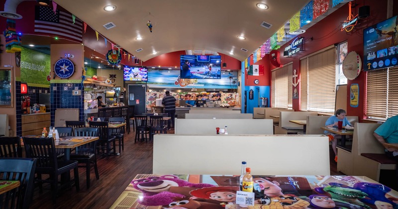 Interior, seating area with a bar in the back