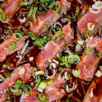 Beef sashimi, close view.
