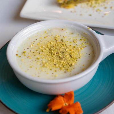 Milk pudding, with pistachios.