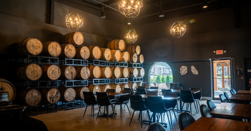 Interior, seating area with barrels in the background