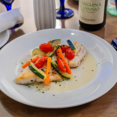 Branzino with vegetables.