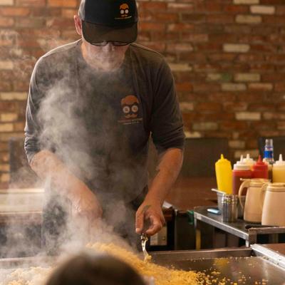 A person preparing food.
