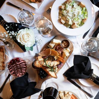 charcuterie board and Caesar salad.