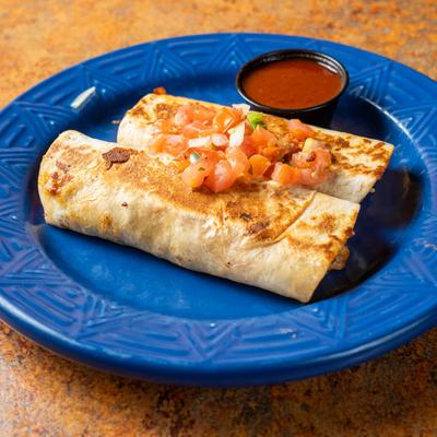 Chimichangas, topped with pico de gallo, served with red salsa.