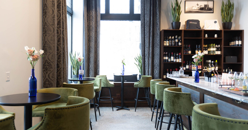 Tables ready for guests on the left, bar area on the righ