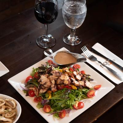 Chicken salad, served with dressing.