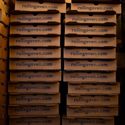 Stacked pizza boxes.