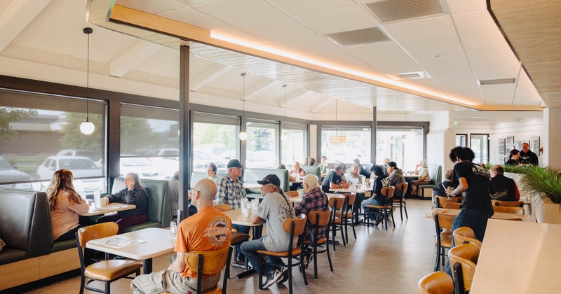 Interior, main dining area filled with guests