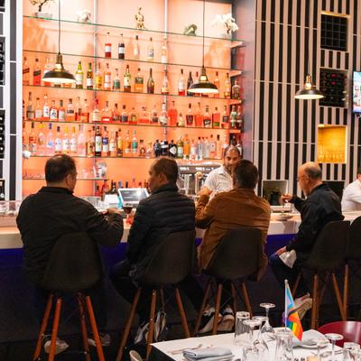 Guests sitting at the bar.