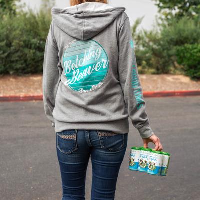 Person holding six pack of beer