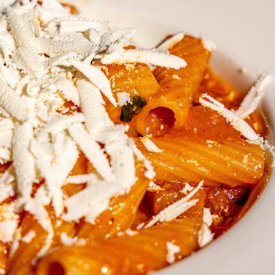 Rigatoni pasta with tomato sauce and cheese.