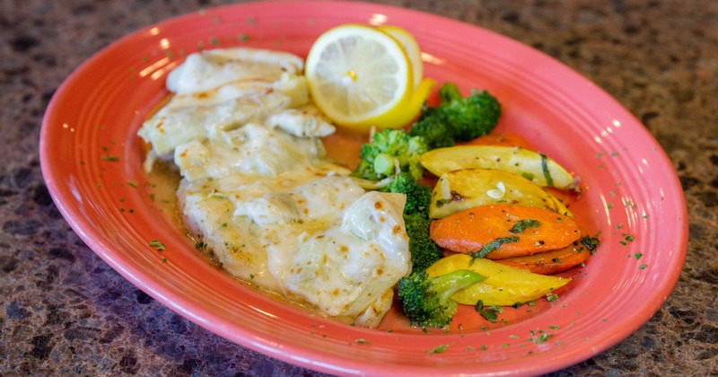 Chicken Parmigiana with sauteed vegetables