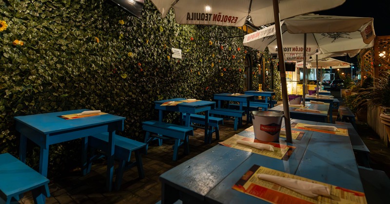 Exterior, blue tables, benches and parasols