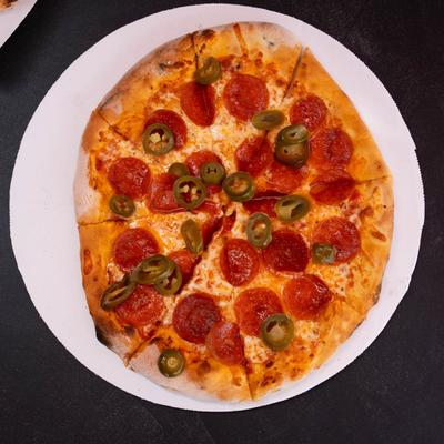 Top-down view of a pepperoni pizza.