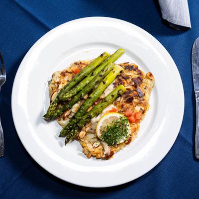 North Carolina Rainbow Almadine Trout served with asparagus.