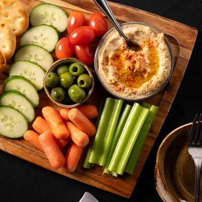 Hummus, Naan, and Crudité Tidbit Board.