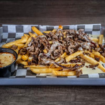 Beef loaded fries with cheese.
