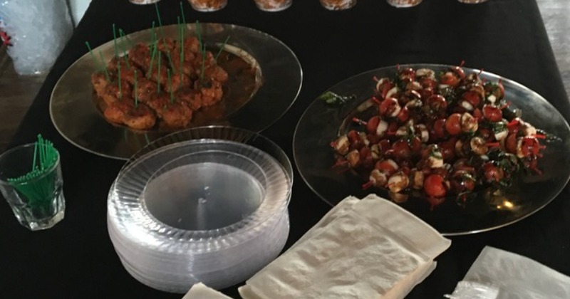 A table with assorted appetizer plates on it