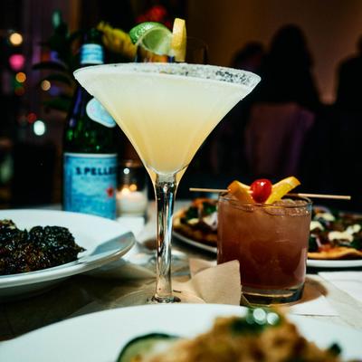 Cocktails served on a restaurant table.