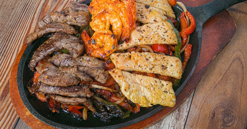 Steak, chicken, and shrimp Fajitas