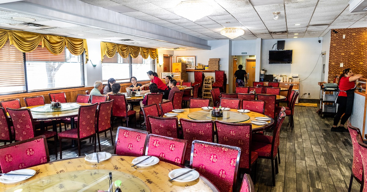 Spacious and cozy interior dining area with set tables