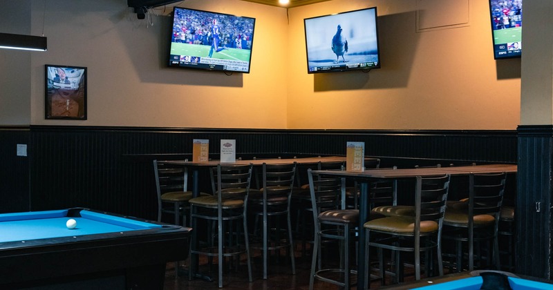 Seating area, tall tables and stools