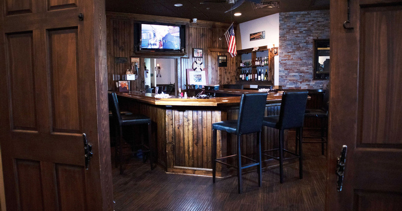 Interior, bar with chairs and TV