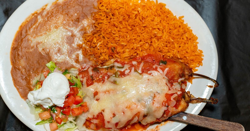 Chile Relleno with rice and refried beans