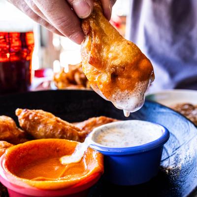 Hold Out Chicken Wings in Tatanka Sauce and dipped in miso ranch.