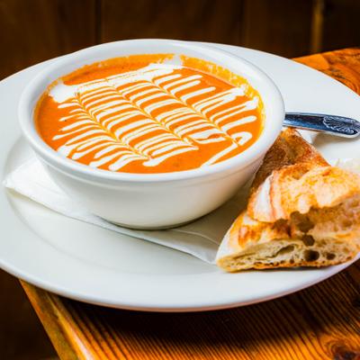 Tomato Basil Soup served with toasted bread.
