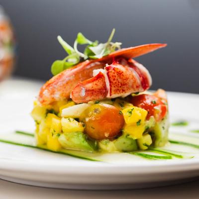 Lobster, mango, avocado, baby heirloom, hearts of palm, champagne vinaigrette.