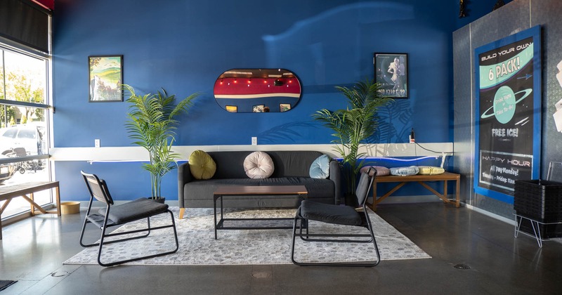 Interior, seating area with couch, armchairs and coffee tables