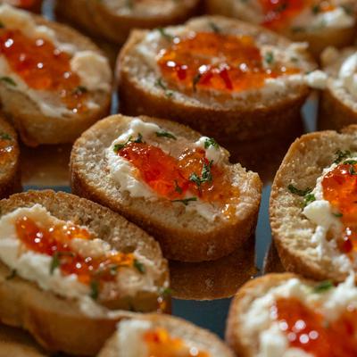 Crostini slices with toppings.