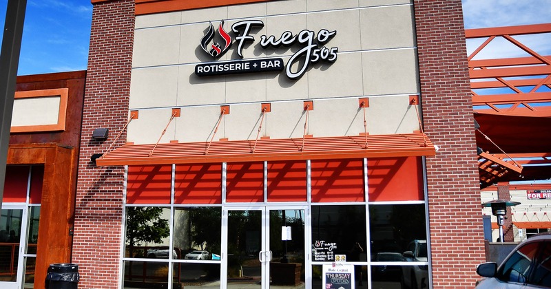 Exterior, front view to restaurant, entrance, sign above
