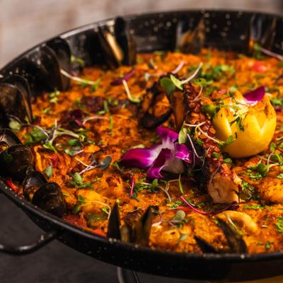 Paella Del Mar with shrimp, octopus, monkfish, mussels, squid and chorizo.