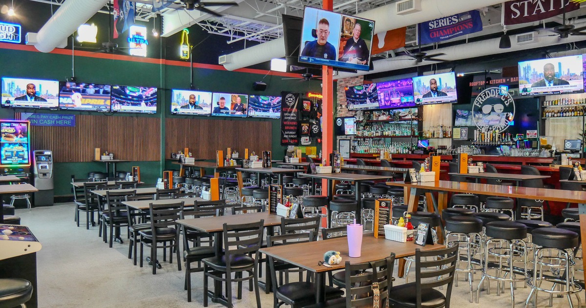 Interior, main seating with bar in the back