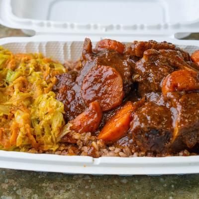 Oxtail rice peas cabbage.