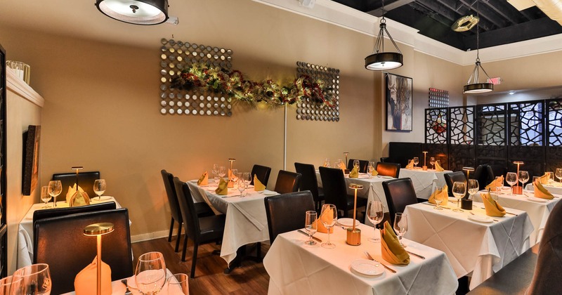 Interior, chairs and tables with tableware