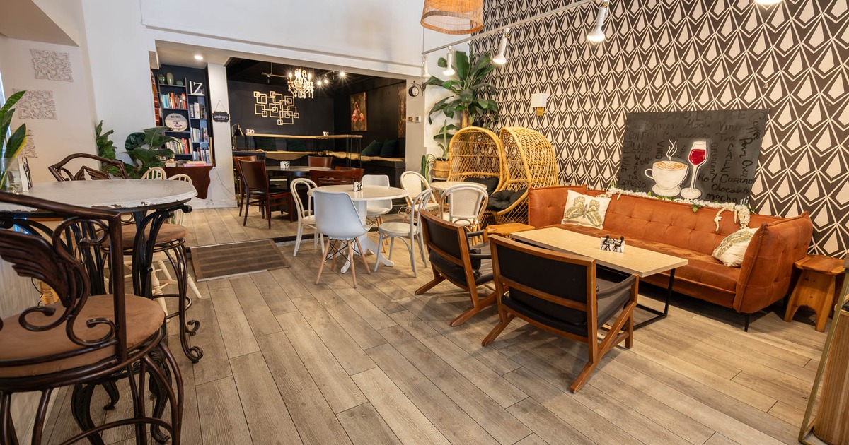 Interior, seating area, sofas with armchairs, table for four, high seating table