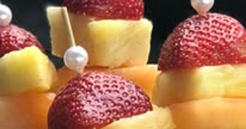 Fruit Skewers with strawberry, melon, pineapple, and grapes