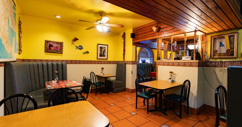 Interior, seating area, framed pictures on the wall