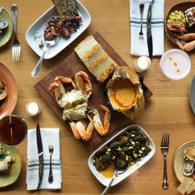 table filled with a variety of dishes and drinks