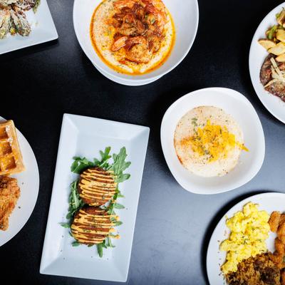A top view of various meals on the table.