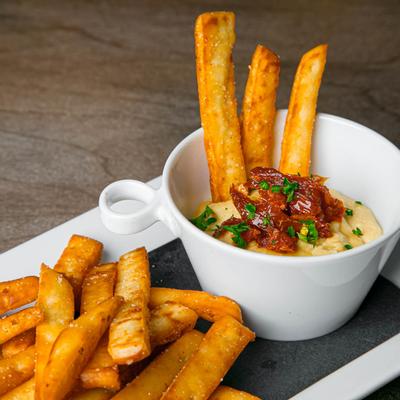 Naan bread sticks with a creamy dip'.