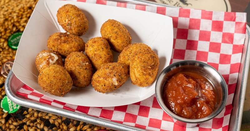 Vegan jalapeno poppers with salsa