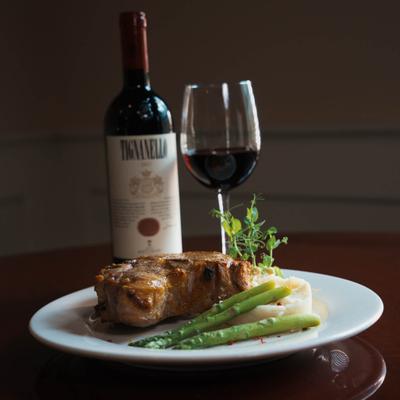 Veal chop and red wine.