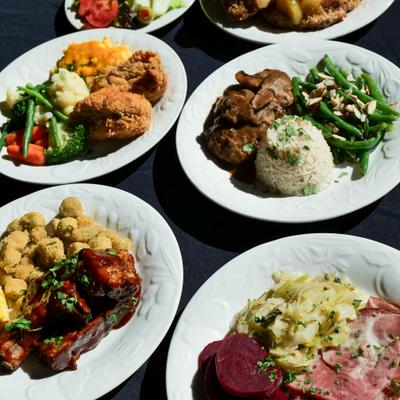 Variety of plates with food.