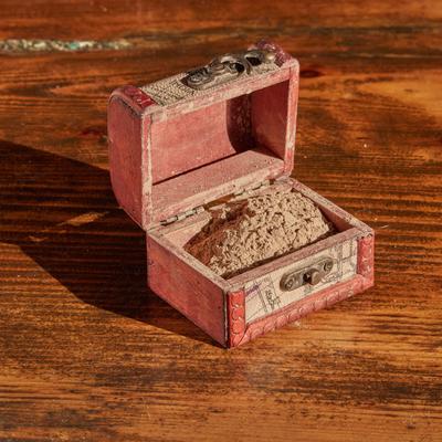 Kava powder in a tiny chest.